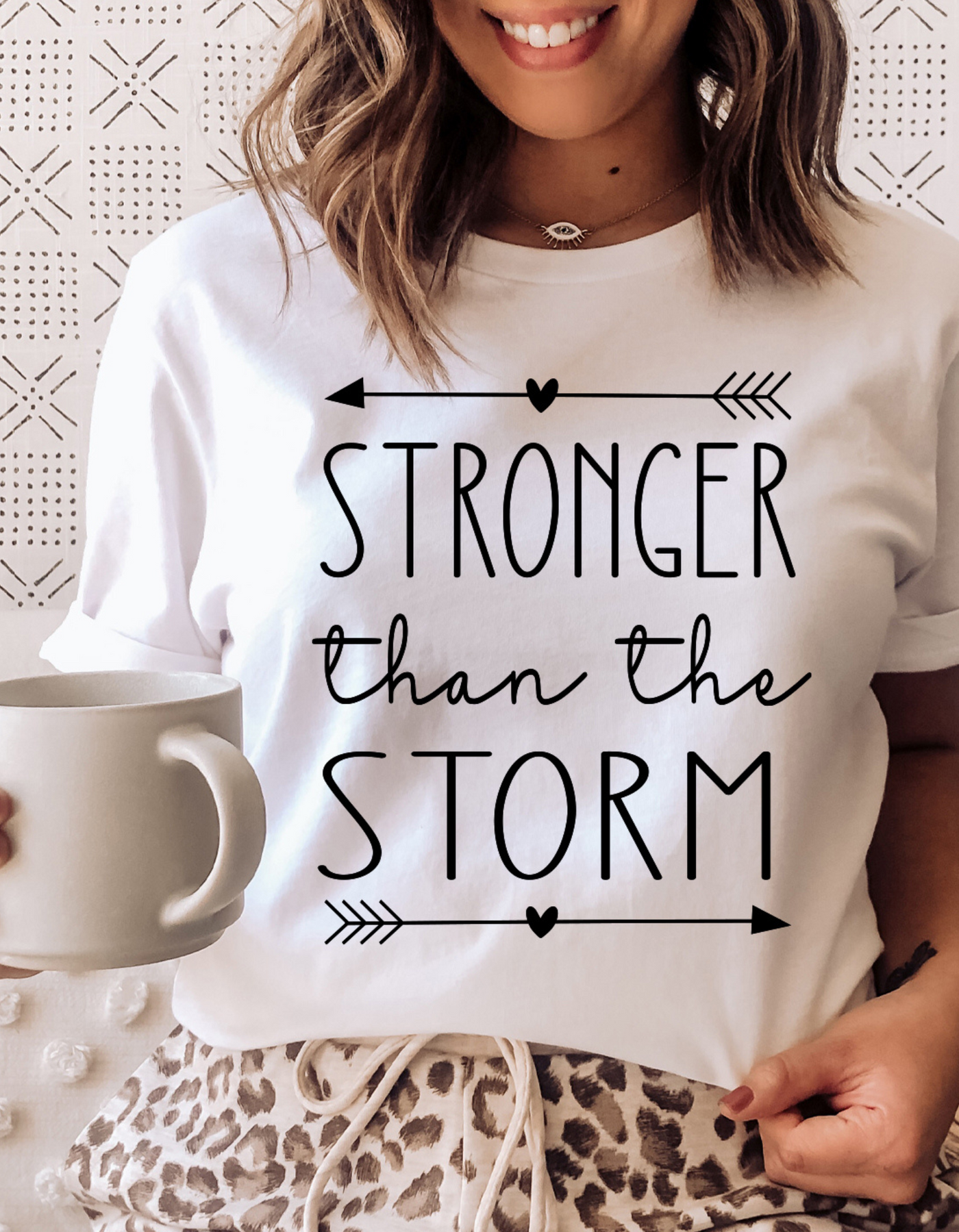 STRONGER THAN THE STORM-TEE